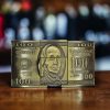 100 Dollars Benjamin Franklin Lighter Belt Buckle Holder in a Bronze finish.