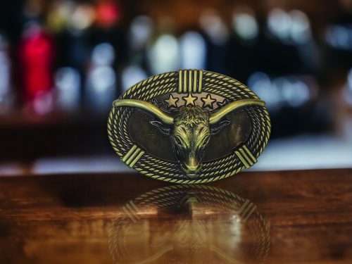 Western Longhorn Cow Belt Buckle with intricate longhorn cow design and polished finish.