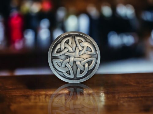 Silver finish Celtic Knot Belt Buckle with intricate design, symbolizing tradition and craftsmanship.