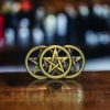Bronze Triple Star belt buckle with Celtic-inspired design, fits 1.5-inch belts, crafted from durable metal alloy.