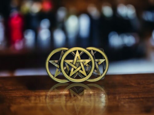 Bronze Triple Star belt buckle with Celtic-inspired design, fits 1.5-inch belts, crafted from durable metal alloy.