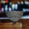 Silver-finish Celtic knot belt buckle with intricate knot patterns, crafted for durability and fitting 1.5-inch belts.
