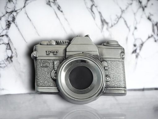 Vintage silver belt buckle featuring a 3D camera design with intricate antique-inspired detailing.