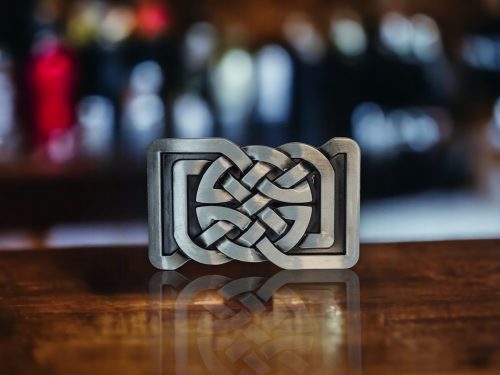 Celtic Pattern Belt Buckle with a sterling silver finish, featuring a traditional design with a five-point star, crafted from durable metal alloy.