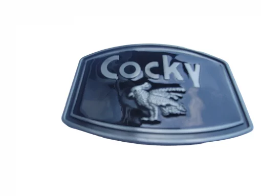 Oval-shaped belt buckle featuring an antique brushed silver finish with a bold glossy black enamel rooster design.