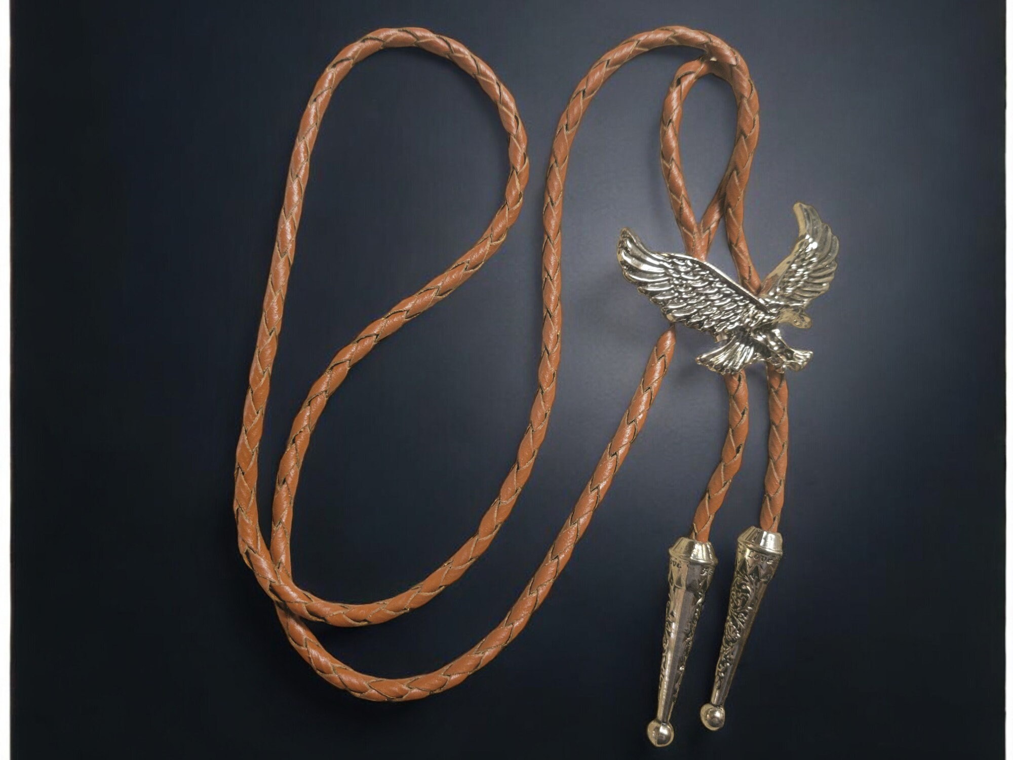 American eagle bolo tie with braided leather cord and metal tips