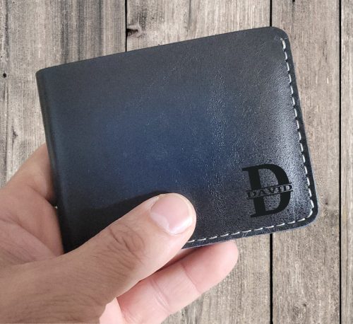 Blue Knight slim leather wallet with white stitching, 6 card compartments, and personalized engraving option