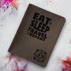 Dark brown leather passport wallet with card slots, hidden pocket & free custom engraving—durable & stylish for global travelers.