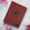 Vintage red leather passport cover with card slots, hidden pocket & free custom engraving—durable & stylish for global travelers.